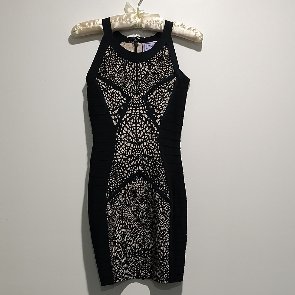 Chic Black and Cream Patterned Mini Dress.